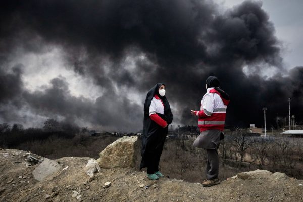 Toxic “Black Rain” Falls on Tehran After U.S.-Israeli Strikes on Iranian Oil Facilities
